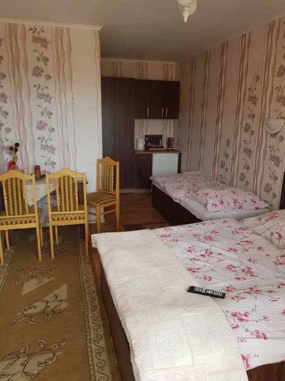 Standard Triple room with garden view