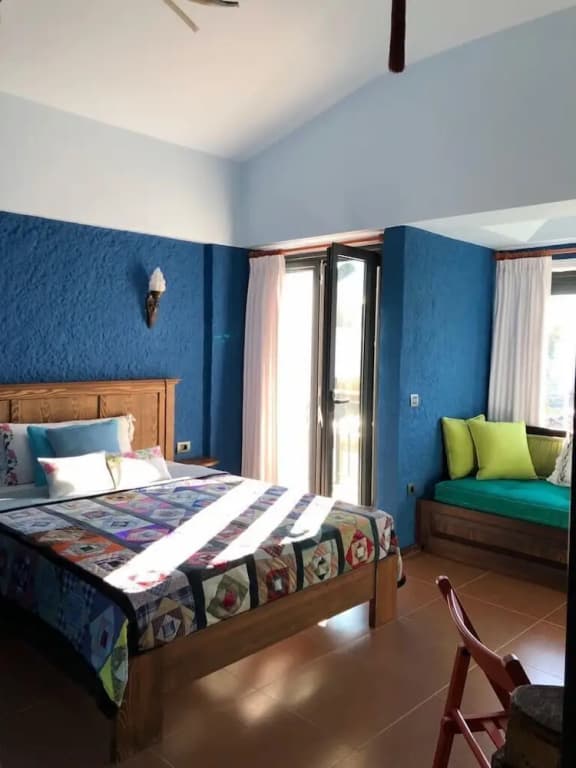 Luxury Triple room with balcony and with garden view