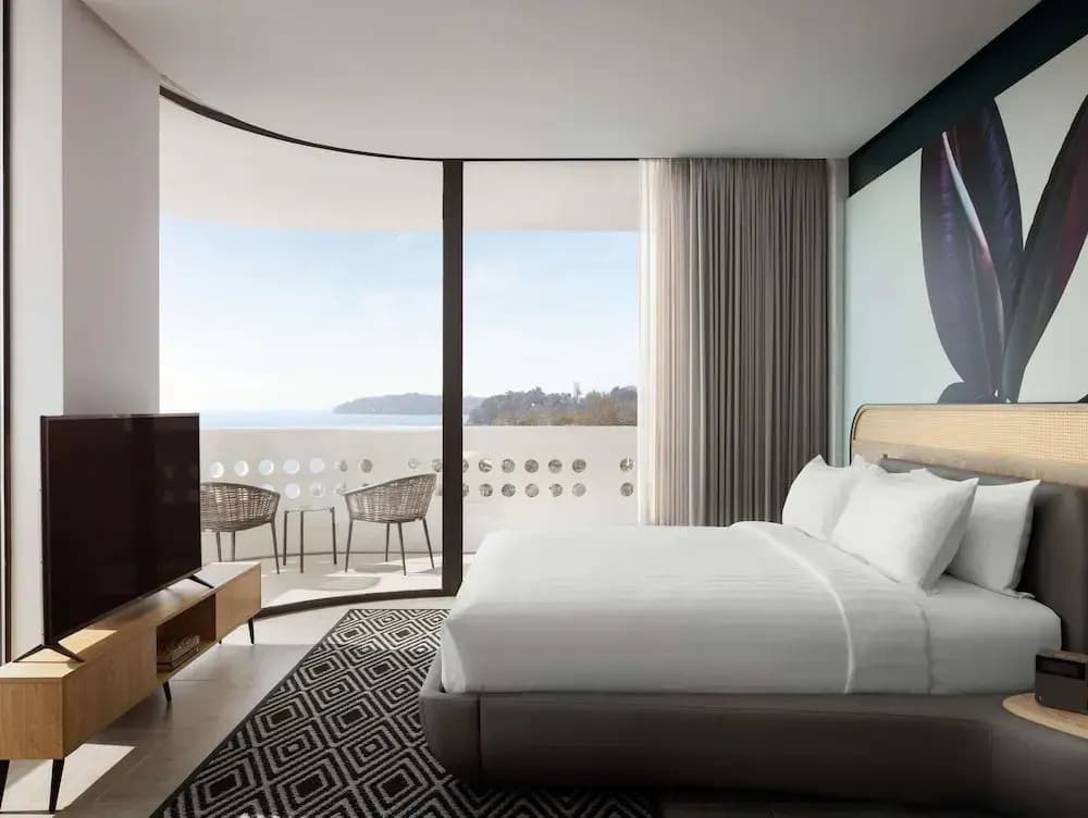 Executive Quadruple Suite with ocean view full double bed