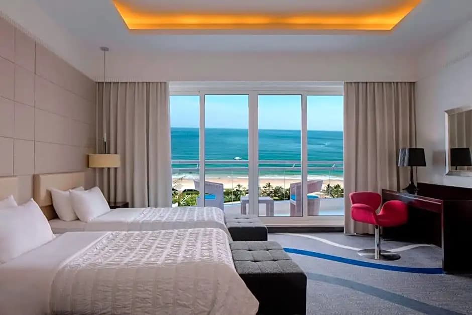 Deluxe Double room with balcony and with ocean view twin beds