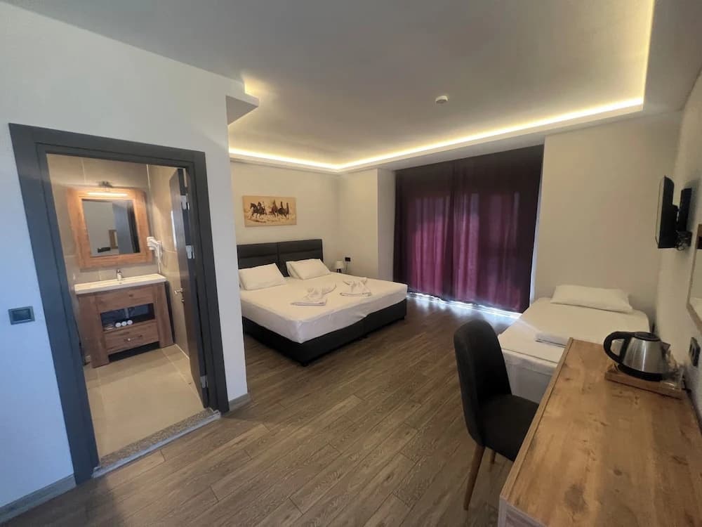 Standard Triple room with garden view