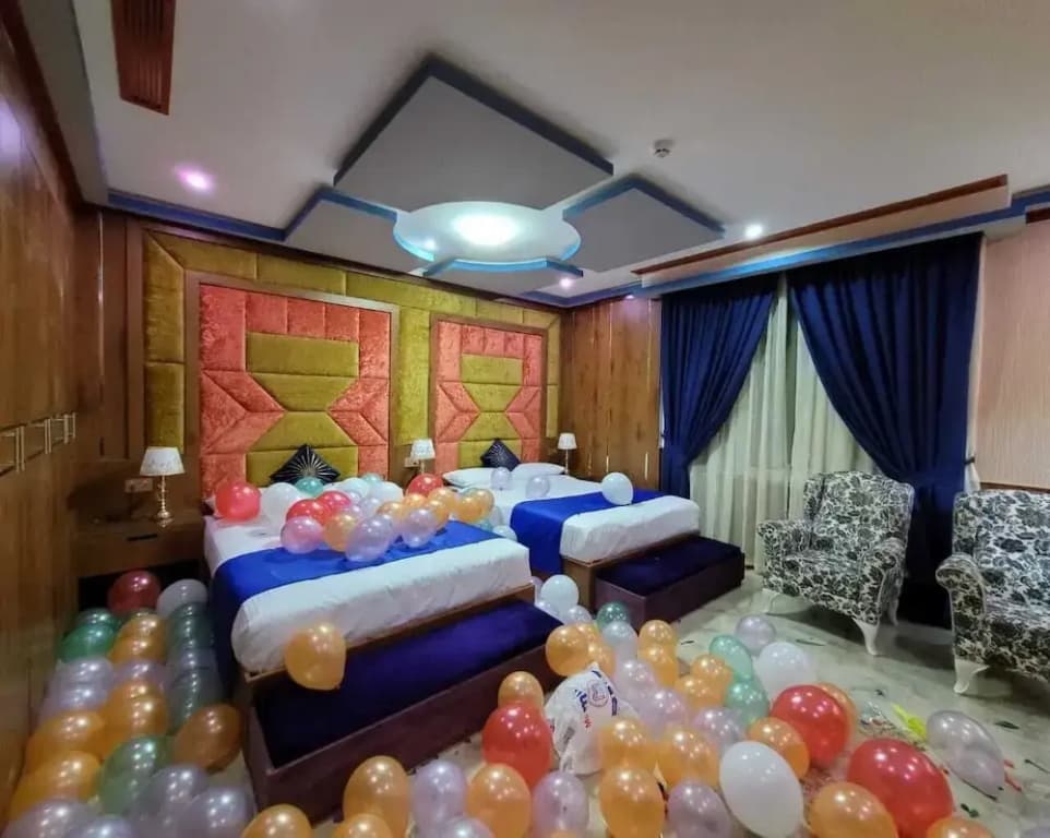 Deluxe Quadruple room with city view