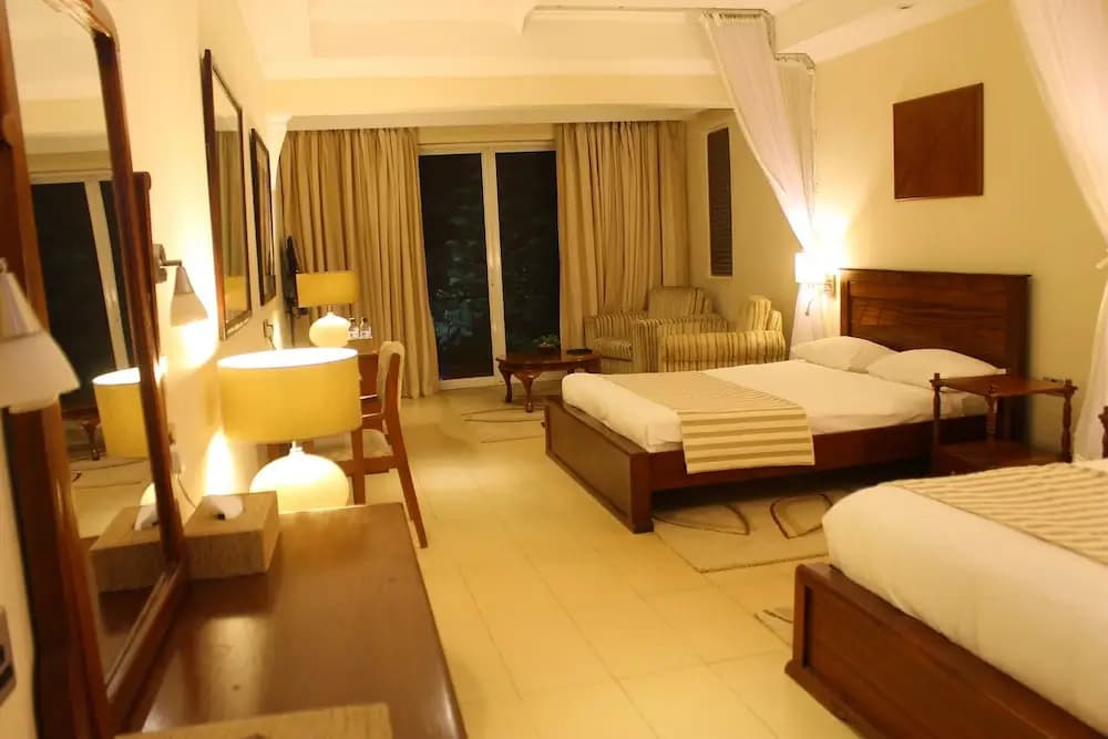 1 Bedroom Deluxe Double Basement room with balcony and with garden view twin beds