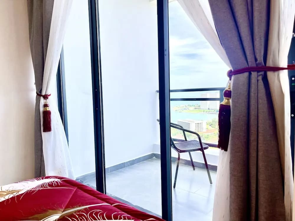 Deluxe Quadruple room with balcony and with city view