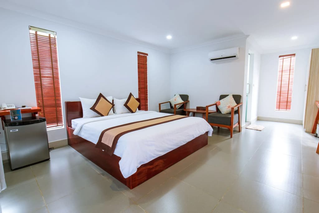 Deluxe Double room with balcony and with garden view full double bed