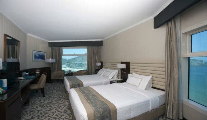 Deluxe Quadruple Family room with partial sea view