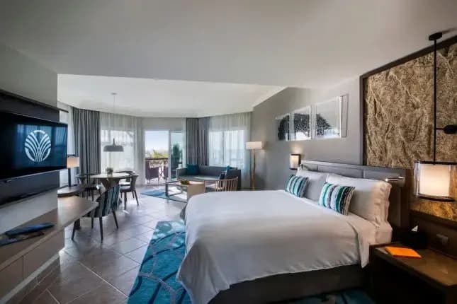 Double Suite with balcony and oceanfront full double bed