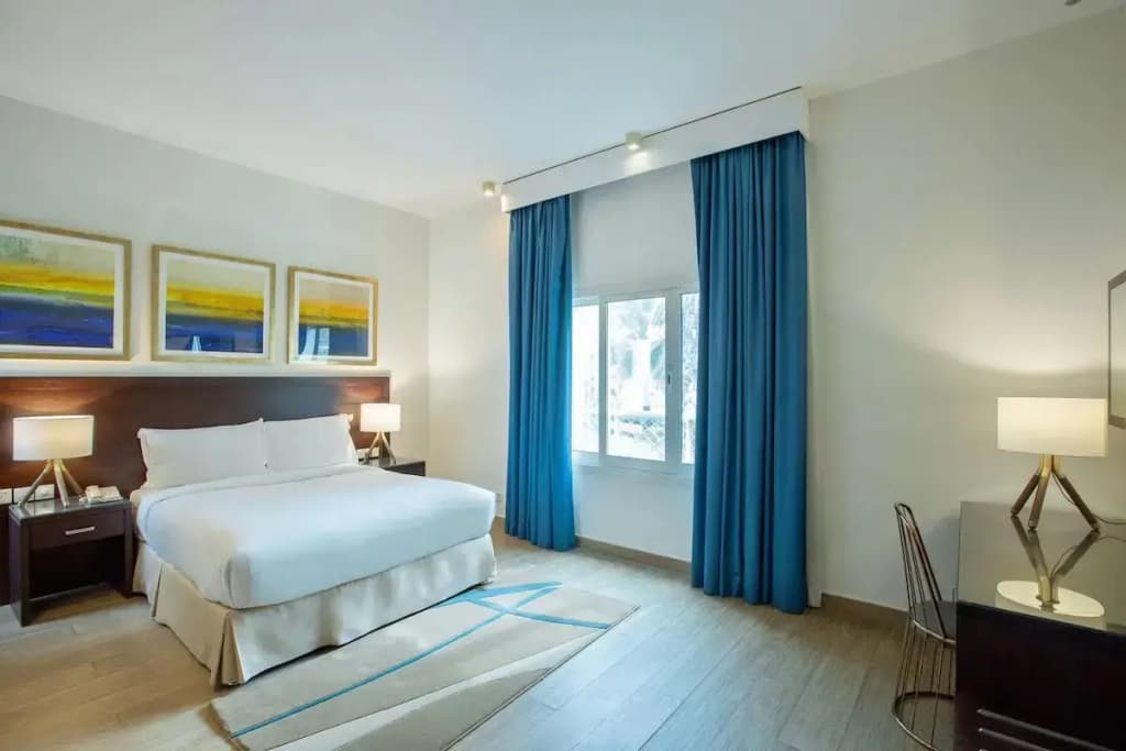 Double Junior Suite with balcony and with ocean view full double bed