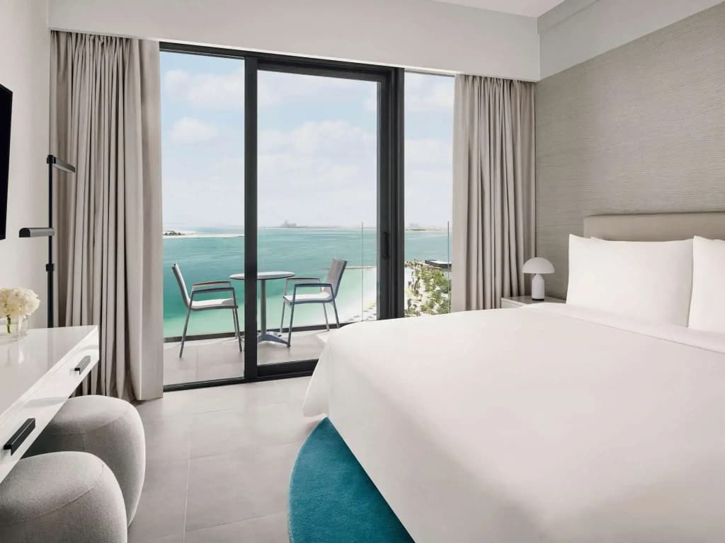 Premium Double room with Beach and Pool view full double bed