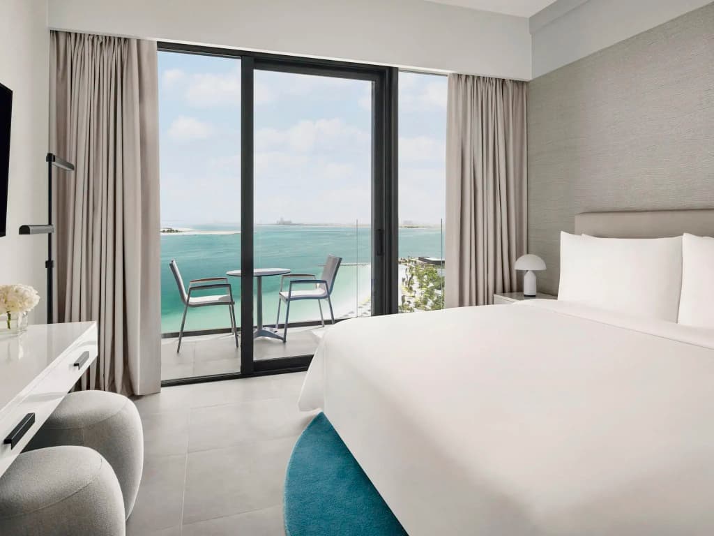 Deluxe Double room with Beach and Pool view full double bed