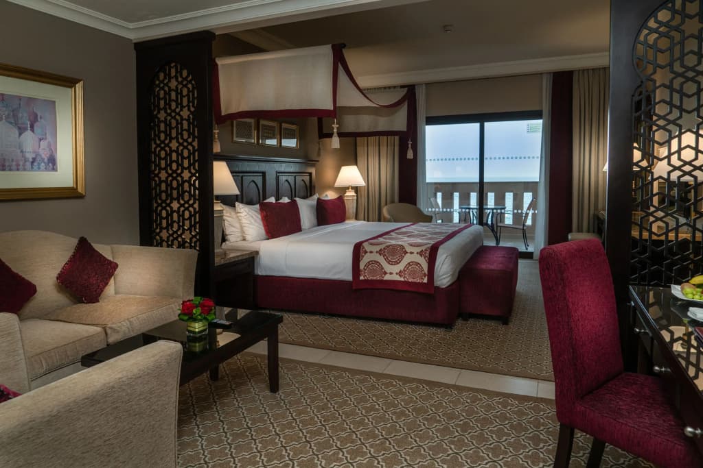 Al Dana Double Junior Suite with partial sea view full double bed