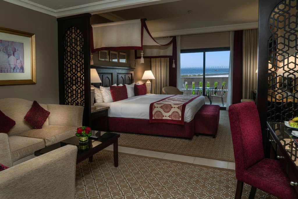 Al Dana Double Junior Suite with ocean view full double bed