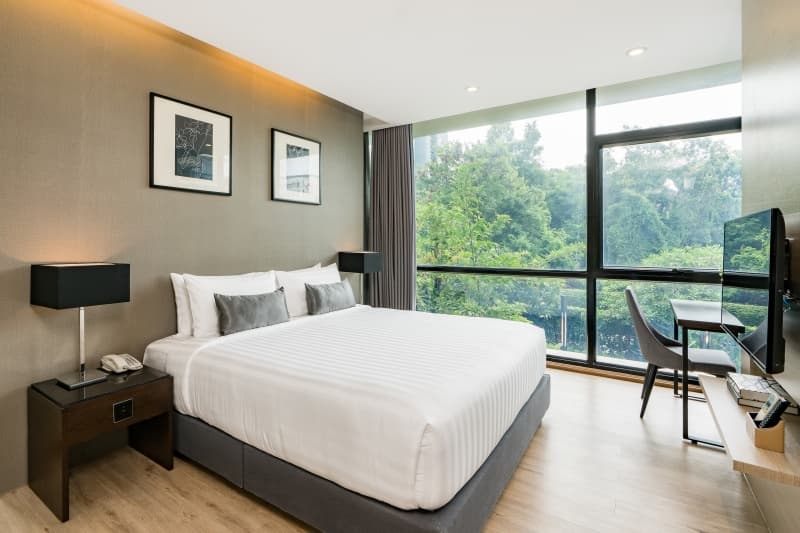 Grand Double Suite with pool view full double bed