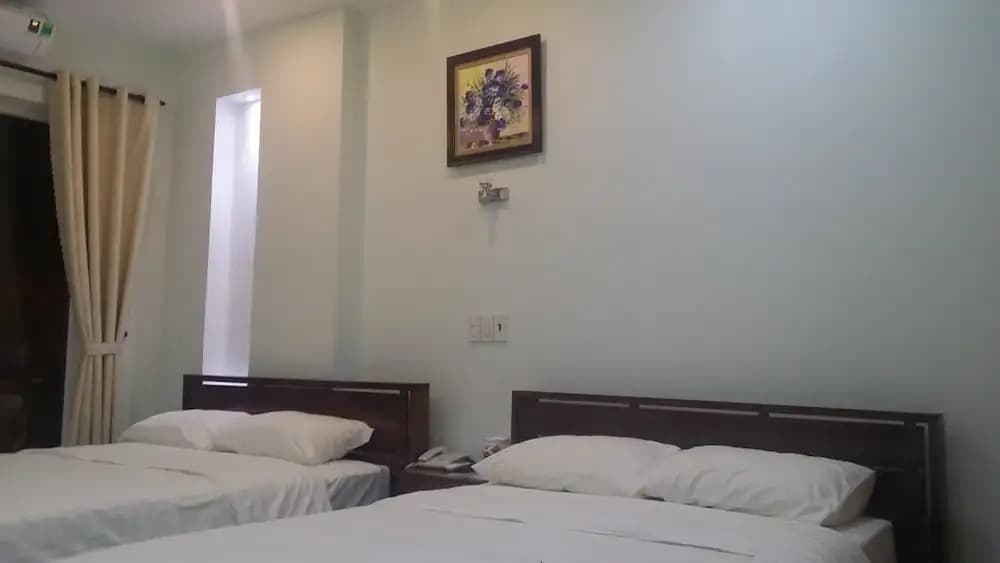 Deluxe Quadruple room with city view